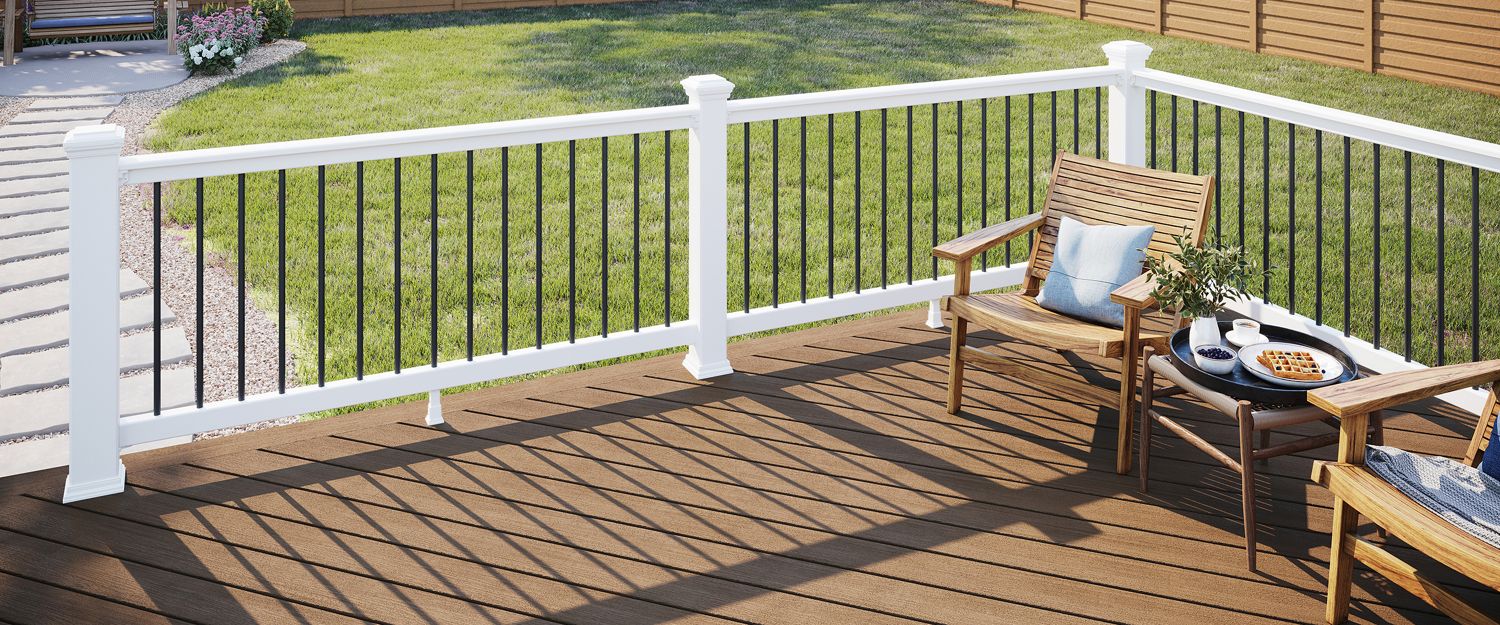 White Trex Select Classic railing with black balusters on a deck