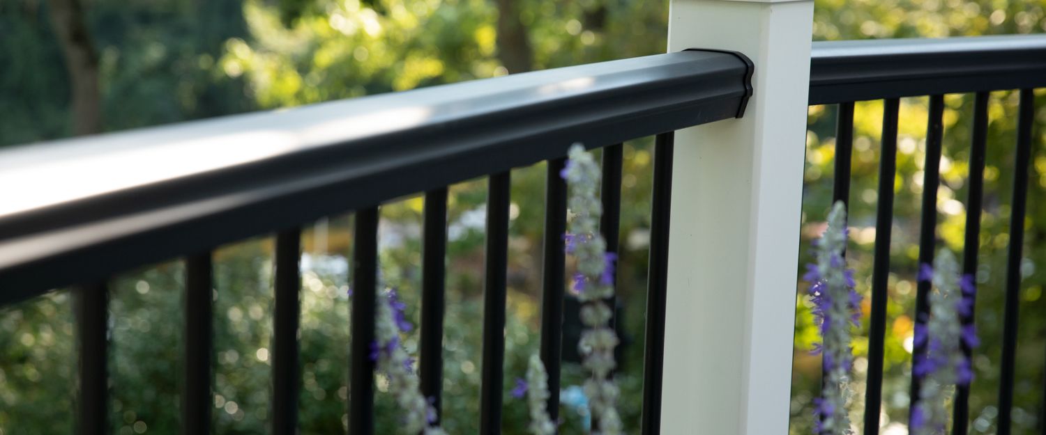 Black Trex Transcend composite railing with black balusters and white post
