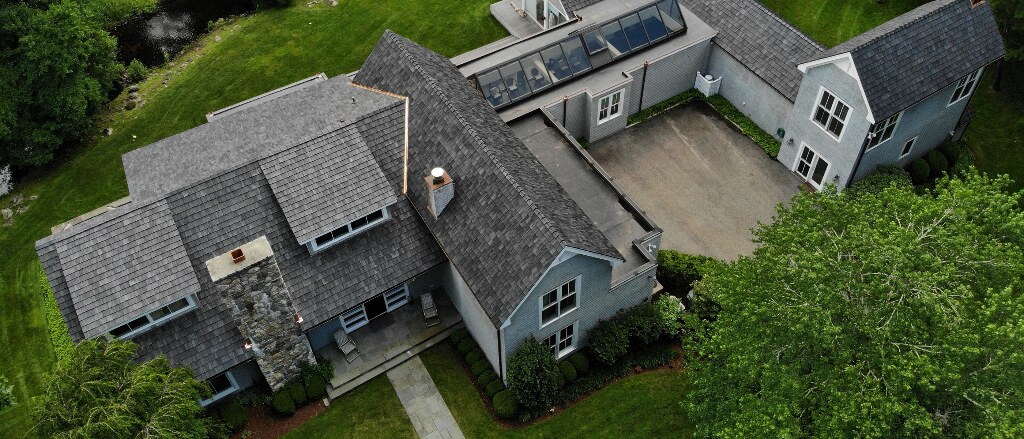 Aerial view of a Brava Old World Slate synthetic roof